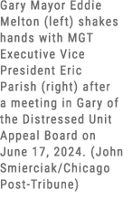 Gary Mayor Eddie Melton (left) shakes hands with MGT Executive Vice President Eric Parish (right) after a meeting in ...